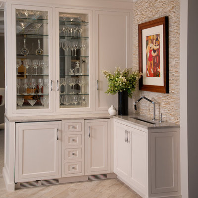 Large elegant galley painted wood floor and gray floor eat-in kitchen photo in Philadelphia with an undermount sink, shaker cabinets, dark wood cabinets, marble countertops, gray backsplash, stone slab backsplash, paneled appliances and an island