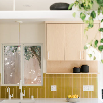 Yellow Kitchen Tiles Backsplash with Window Trim