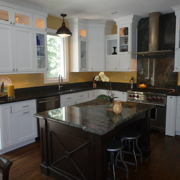 Yellow Kitchen with Green Fire Granite and White Cabinets