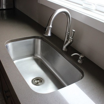 Zodiaq sage counters with large single-bowl sink