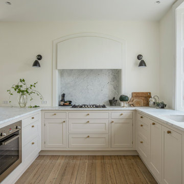 Ekeby Sand køkken med marmor bordplade