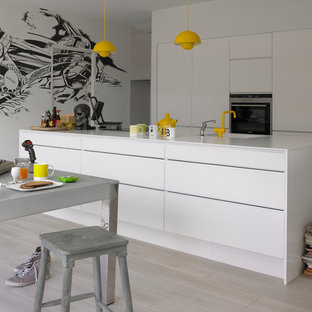 This is an example of a large modern kitchen in Other with a drop-in sink, flat-panel cabinets, white cabinets and with island.