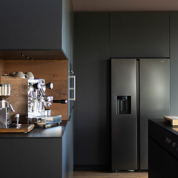 Beautiful black- Moderne Wohnküche mit Bora-Professional Kochfeld und rustikaler