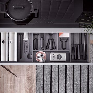 Modern-minimalistischer Küchentraum in einem matten grau