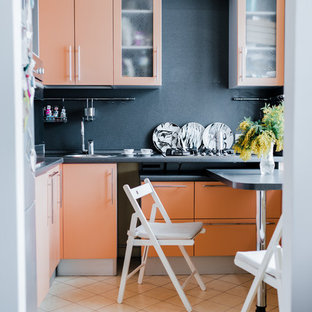 Photo of a small contemporary l-shaped eat-in kitchen in Moscow with flat-panel cabinets, orange cabinets, solid surface benchtops, grey splashback, ceramic floors, no island and beige floor.