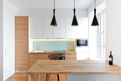 Photo of a contemporary kitchen in Moscow.