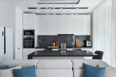 Свежая идея для дизайна: прямая кухня-гостиная среднего размера в современном стиле с островом - отличное фото интерьера