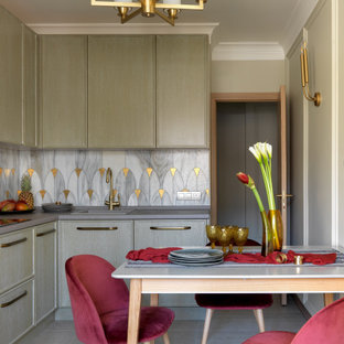 Inspiration for a small transitional l-shaped separate kitchen in Moscow with a drop-in sink, green cabinets, multi-coloured splashback, no island, grey floor, grey benchtop and beaded inset cabinets.