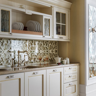 Photo of a transitional galley kitchen in Moscow with an integrated sink, recessed-panel cabinets, white cabinets, white splashback, no island, white floor and beige benchtop.