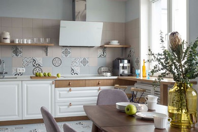 他の地域にある北欧スタイルのおしゃれなキッチンの写真