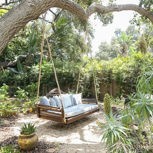 Photo of a mediterranean backyard garden in Los Angeles with gravel.