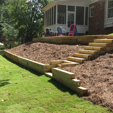3 Tier PT Timber Walls, PT Timber Steps, Paver Patio, Irrigation, Sod, Drainage