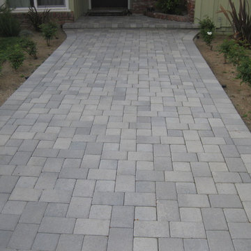 A complete redo of the front yard. A practical solution and a beautiful window v