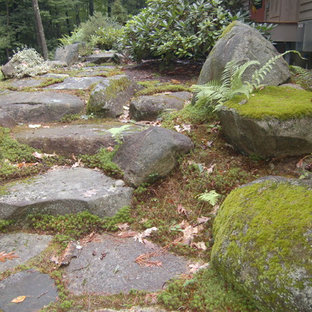 Design ideas for a mid-sized rustic landscaping in Manchester.