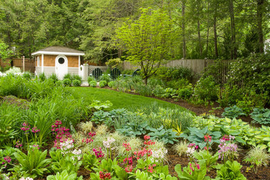 Photo of a large contemporary shade backyard stone garden path in DC Metro for spring.
