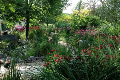 Design ideas for a mid-sized rustic landscaping in Minneapolis.