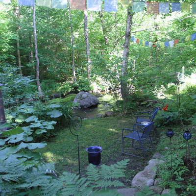 Inspiration for an eclectic shade backyard landscaping in Burlington.