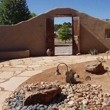 Adobe Wall and Banco with Desert Landscape