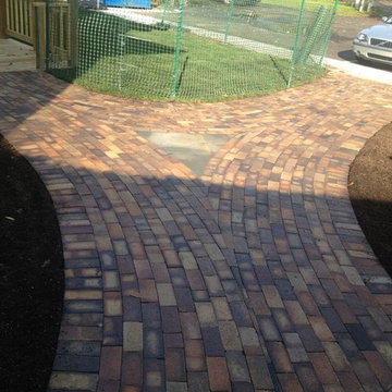 After Brick walkway with lilac flagstone inlay