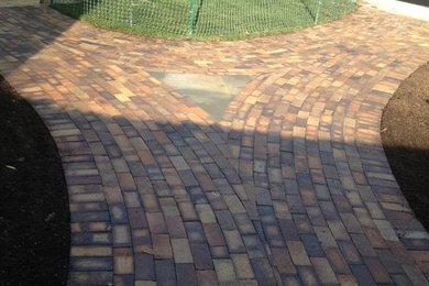 After Brick walkway with lilac flagstone inlay