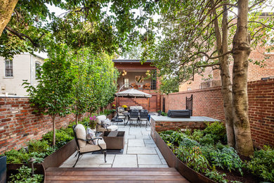 Inspiration for a small transitional courtyard landscaping in DC Metro.