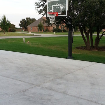 Andy C's Pro Dunk Silver Basketball System on a 20x30 in Aledo, TX