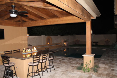 Example of a small southwest courtyard patio design in Phoenix