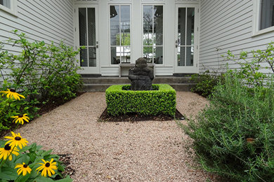 Inspiration for a mid-sized asian drought-tolerant and full sun courtyard gravel garden path in Houston for spring.