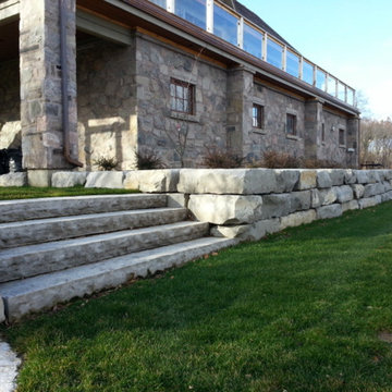 Armour stone retaining w/guillotined stone steps
