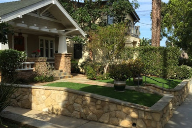 This is an example of a mid-sized traditional partial sun front yard garden path in Santa Barbara.