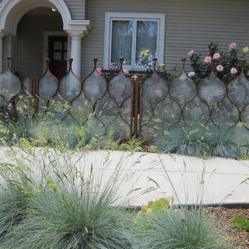 Artistic fence as garden highlight