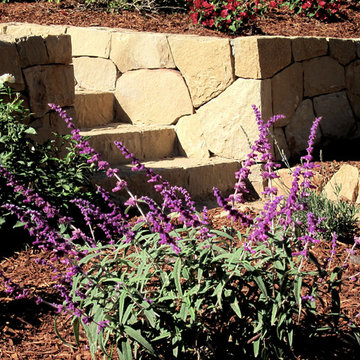 Authentic Santa Barbara Sandstone garden walls and hand chiseled Sandstone steps