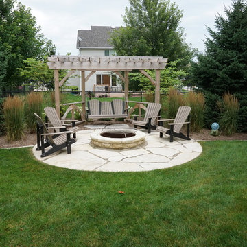Backyard Fire Pit with Pergola and Swing