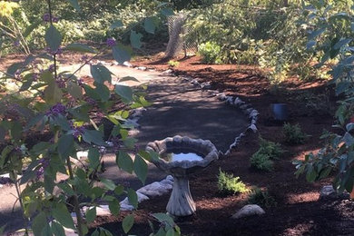 Design ideas for a large traditional full sun backyard gravel landscaping in Portland.