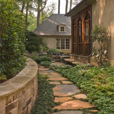Inspiration for a traditional shade side yard water fountain landscape in Atlanta.