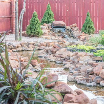 Backyard Oasis with Expansive Water Feature