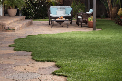 Design ideas for a contemporary backyard concrete paver landscaping in San Diego.