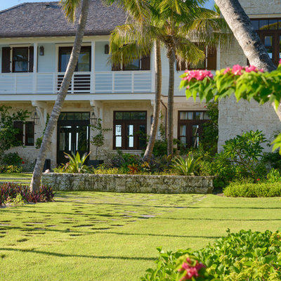 Photo of a tropical backyard landscaping in Miami.