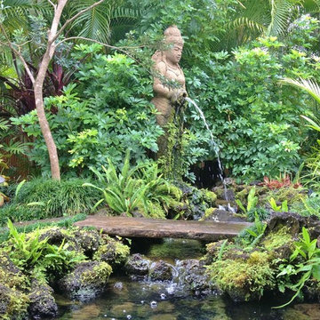 Bali statue with fountain, stream and pond water feature