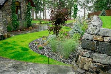 Photo of a mid-sized transitional landscaping in Vancouver.