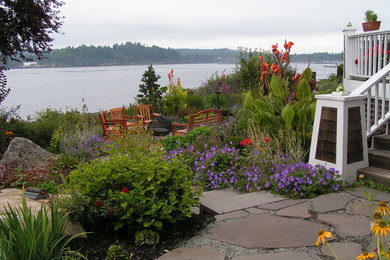 Inspiration for a coastal landscaping in Seattle with a fire pit.