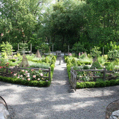 Photo of a large eclectic partial sun backyard gravel vegetable garden landscape in San Francisco for summer.