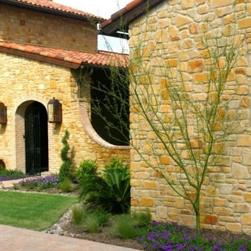 Beautifully colored landscaping and entrance