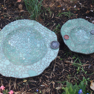 Bird baths made from recycled auto glass