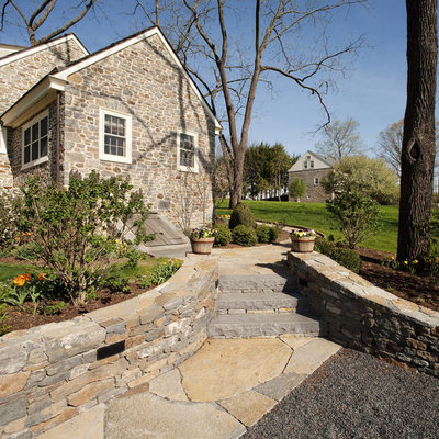 Photo of a traditional hillside stone landscaping in Philadelphia for spring.