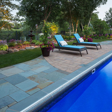 Bluestone and Red Brick Pool Deck | A Vadnais Heights Residence