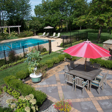 Bluestone Patio surrounded by traditional landscaping