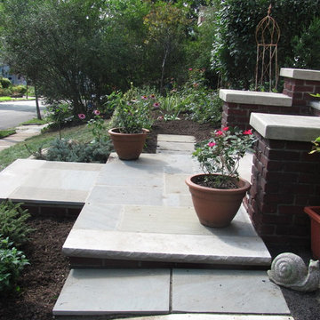 Brick front steps and entrance garden