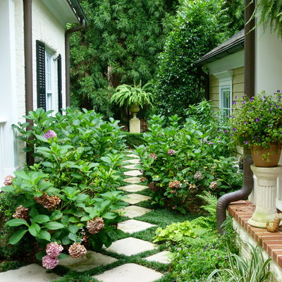 Inspiration for a traditional full sun concrete paver garden path in Atlanta.