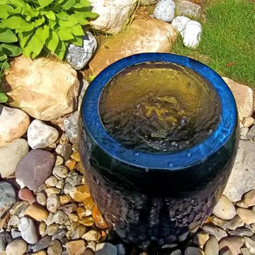 Bubbling urns are just one type of water feature Lentzcaping has designed